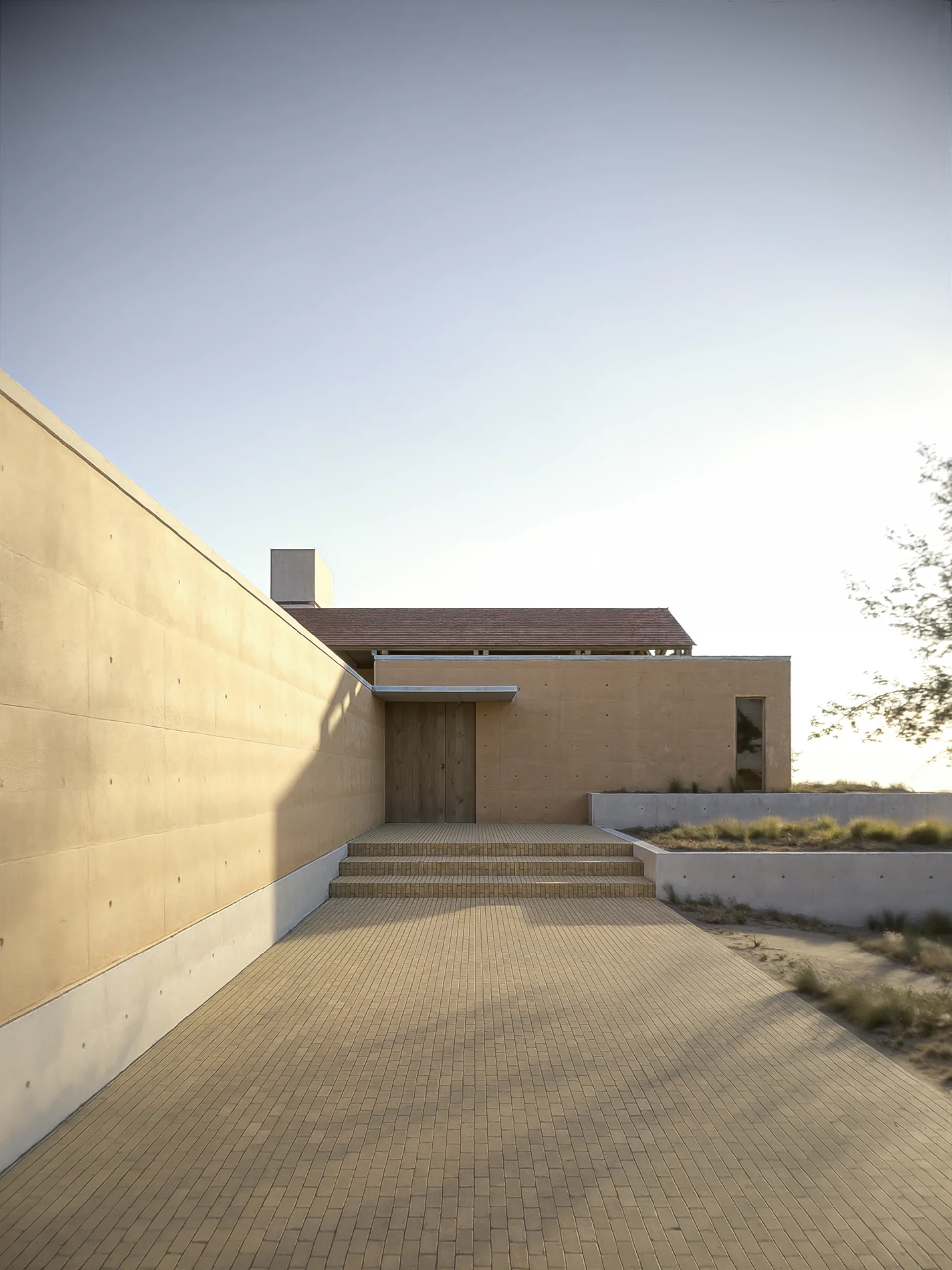 Render del acceso principal de la casa muestra