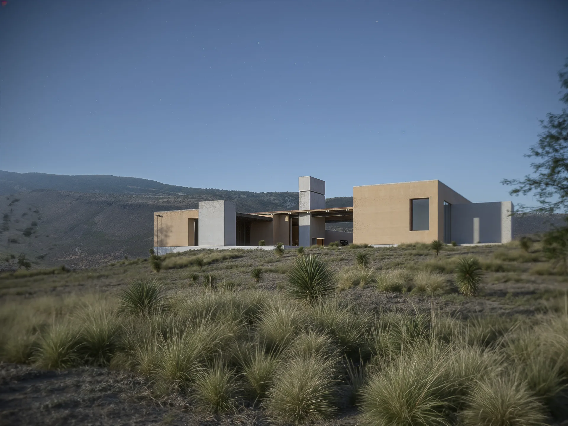 Render exterior posterior de la casa muestra al anochecer